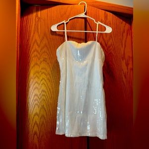 NWT! Made with payette sequins, this dress is the definition of festive and fun